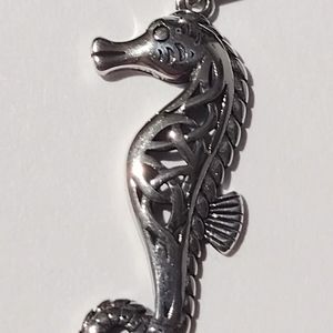 STERLING SILVER SEAHORSES - PAIR.